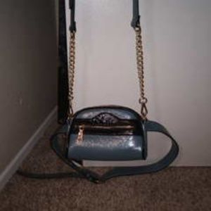 Cute teal/black cross body/waist bag